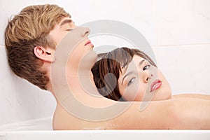 Young couple taking a bath.