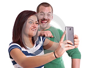 Young couple taking selfie