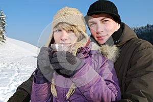 Young couple with tea