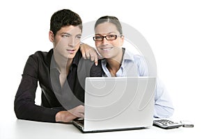 Young couple teamwork cooperation with laptop
