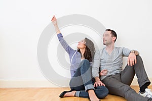 Young couple in their brand new flat / Textspace