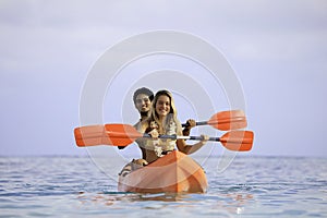 Young couple with their kayak