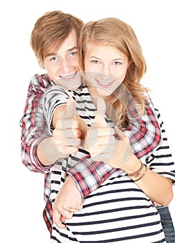Young couple with thumb up