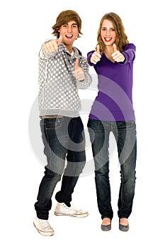 Young couple with thumbs up