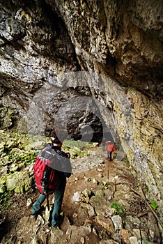 Young couple to the entrance in Cioclovina cave.