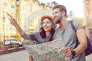 Young couple tourists city walk together vacation photo