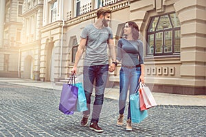 Young couple tourists city walk together vacation