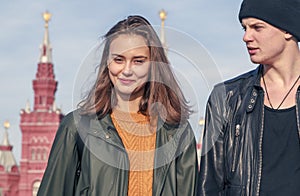 A young couple of tourists walking in Red Square