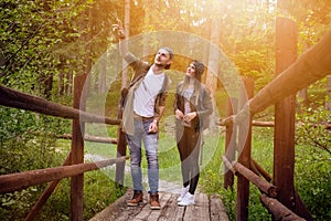 Young couple traveling in a nature. Happy people. Travel lifestyle