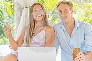 Young couple using a laptop