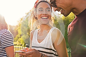 Young couple using mobile phone