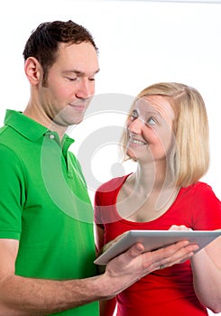 Young couple using tablet pc