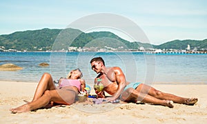 Young couple vacationer having genuine fun on tropical Phuket be photo