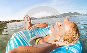 Young couple vacationer having genuine fun on tropical Phuket be photo