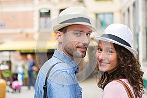 Young couple visiting city during holidays