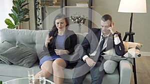 Young couple visiting family counselor. Marriage counseling