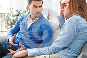 Young couple waiting for psychology session family problems quarelling close-up