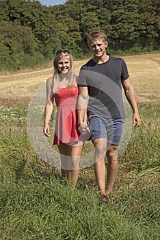 Young couple walking in countryside