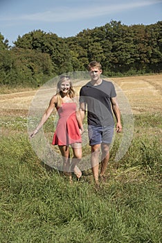 Young couple walking in countryside