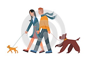 Young couple walking with dogs, man and woman with animal friends