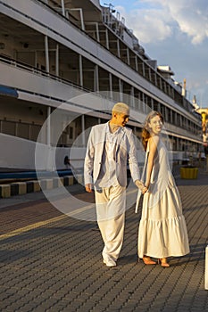 young couple walking in the port