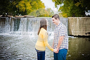 Young Couple by Waterfall