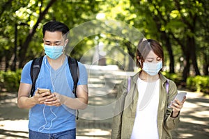 Young couple wear face mask during coronavirus and flu