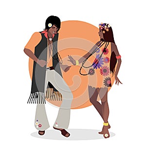 Young couple wearing hippie clothes of the 60s and 70s dancing