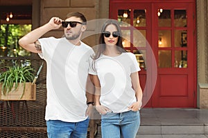 Young couple wearing white t-shirts