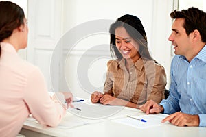 Young couple working with financial advisor