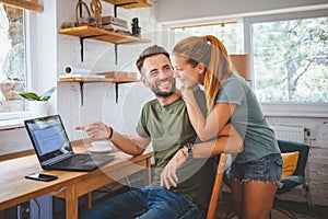 Young couple working on laptop