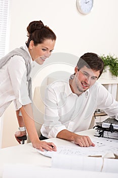 Young couple working together