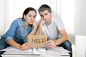 Young couple worried at home in bad financial situation stress