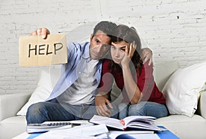 Young couple worried at home in bad financial situation stress asking for help