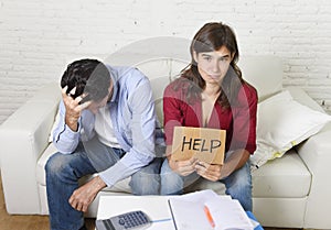 Young couple worried at home in bad financial situation stress asking for help