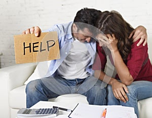 Young couple worried at home in bad financial situation stress asking for help