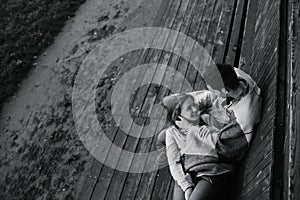 Young couple wrapped in plaid outfocus