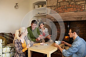 Young couples in cosy cottage