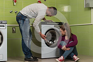 Young Couples Doing Housework Laundry