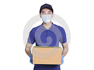 Young courier, employed wearing blue clothes and hats, protective masks and gloves to protect himself, delivering packages during