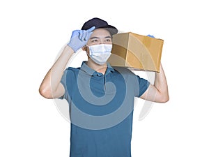 Young couriers wear medical masks before work during the covid-19 epidemic. The package is carried on the shoulder, and the hand i