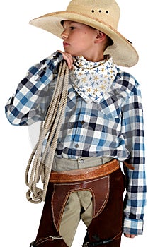 Young cowboy in big hat holding a rope