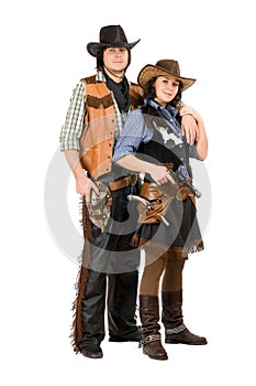 Young cowboy and cowgirl