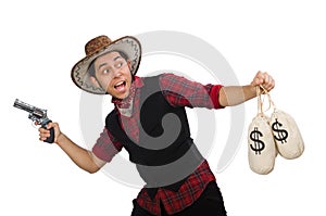 Young cowboy with gun and money bags isolated on