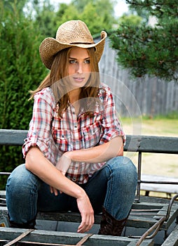 Young cowgirl in hat