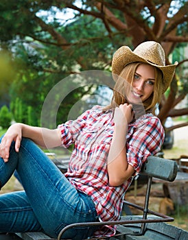 Young cowgirl in hat