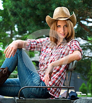 Young cowgirl in hat