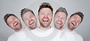 young crazy man laughing out loud at some hilarious joke, feeling happy