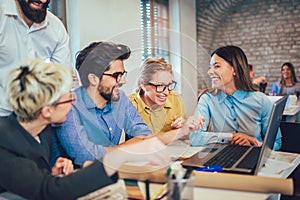 Young creative coworkers working with new startup project