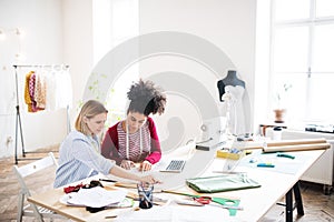 Young creative women in a studio, startup business.